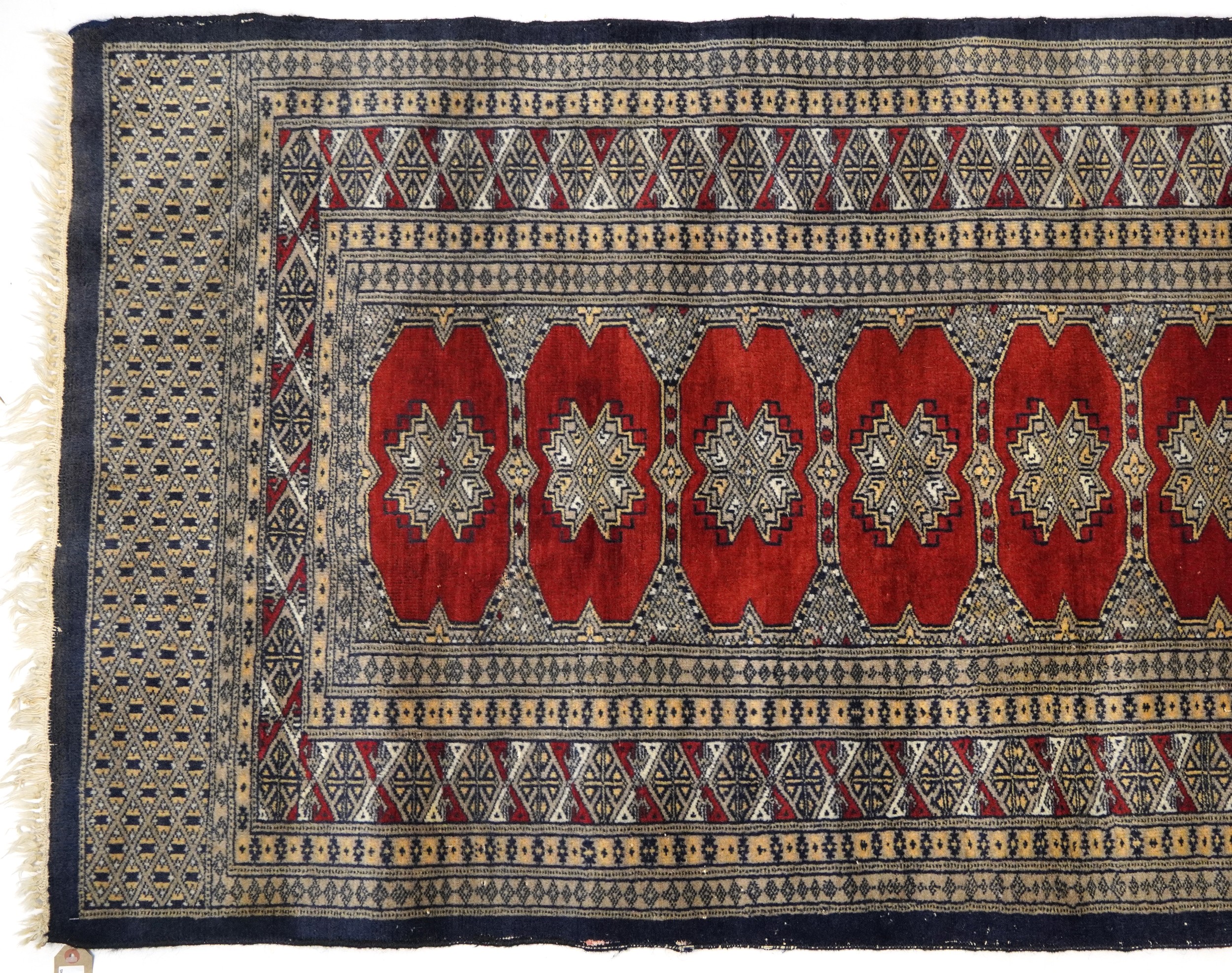 Rectangular red and blue ground rug with all over geometric design, 165cm x 92cm - Image 2 of 4