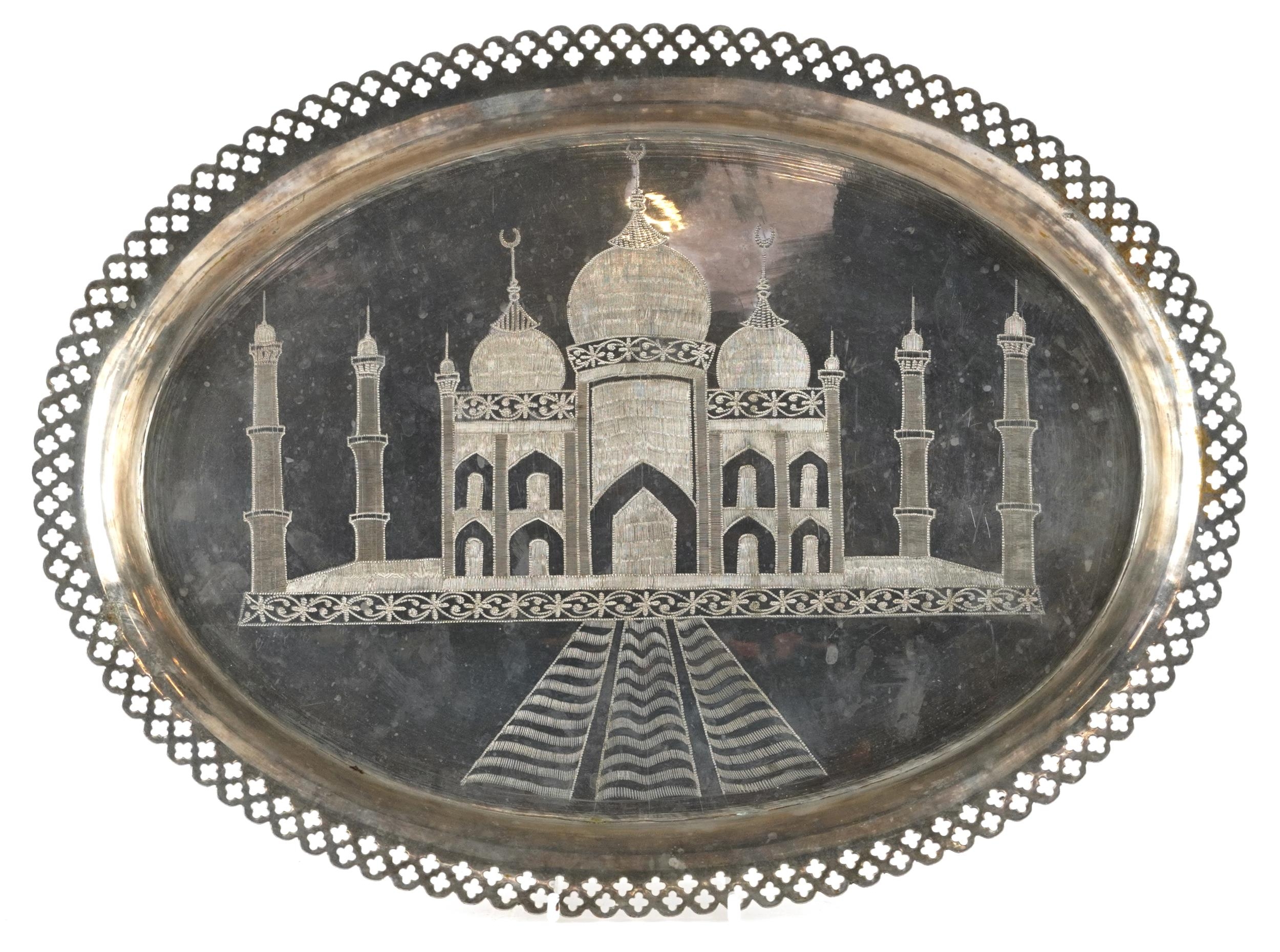 Indian oval silver plated tray engraved with the Taj Mahal and pierced border, 38cm wide