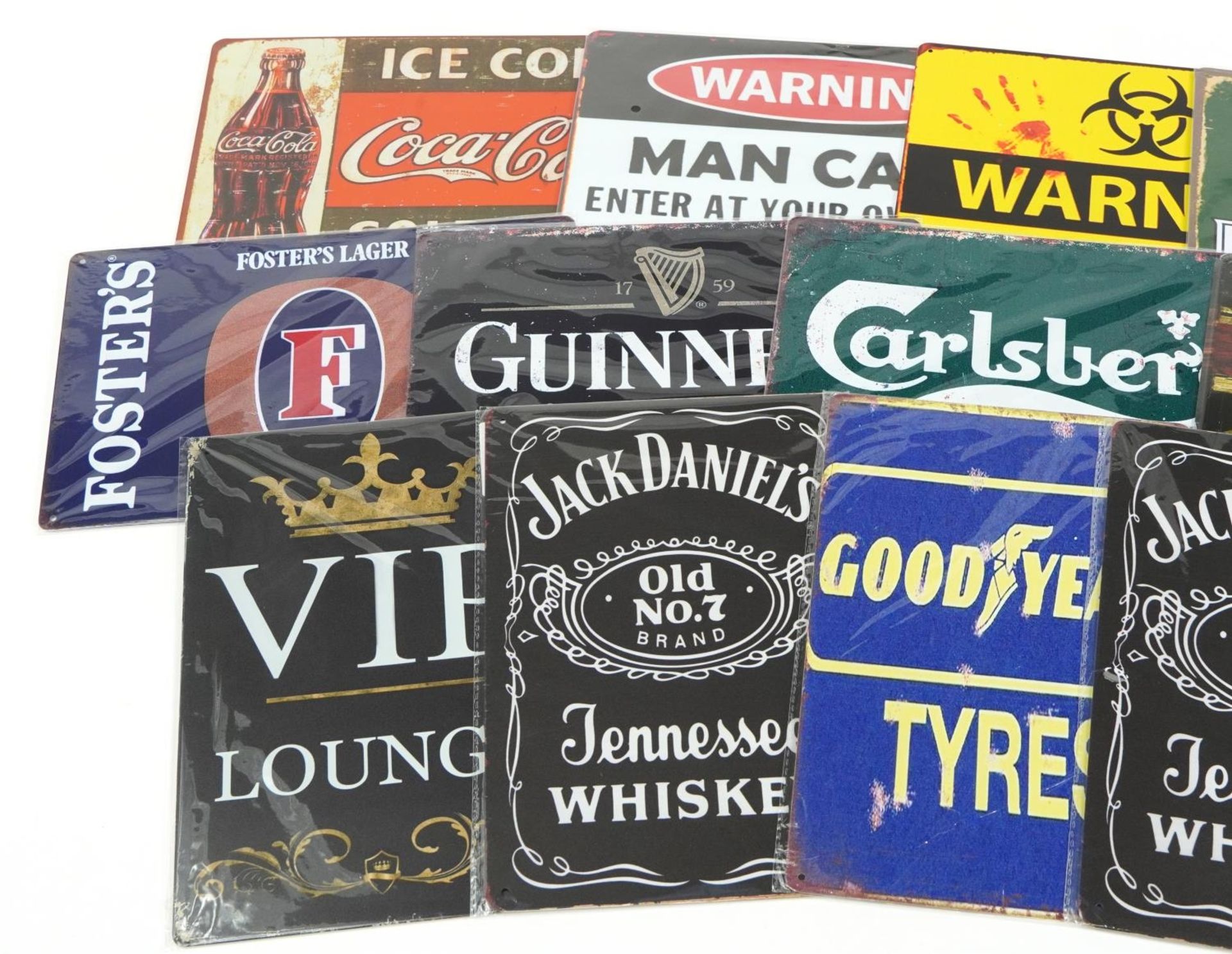 Sixteen tin advertising and man cave signs including J P S, Jack Daniels, Carlsberg, Guinness and - Image 2 of 3