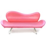 Red leather lips design salon settee raised on chrome legs, 180cm wide