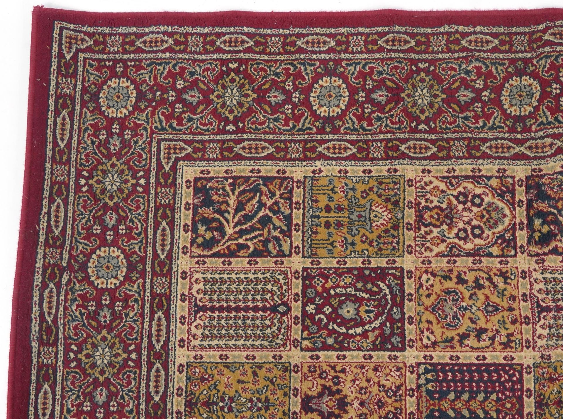 Rectangular Persian rug, the central field having a repeat tree design, the red ground borders - Bild 2 aus 7