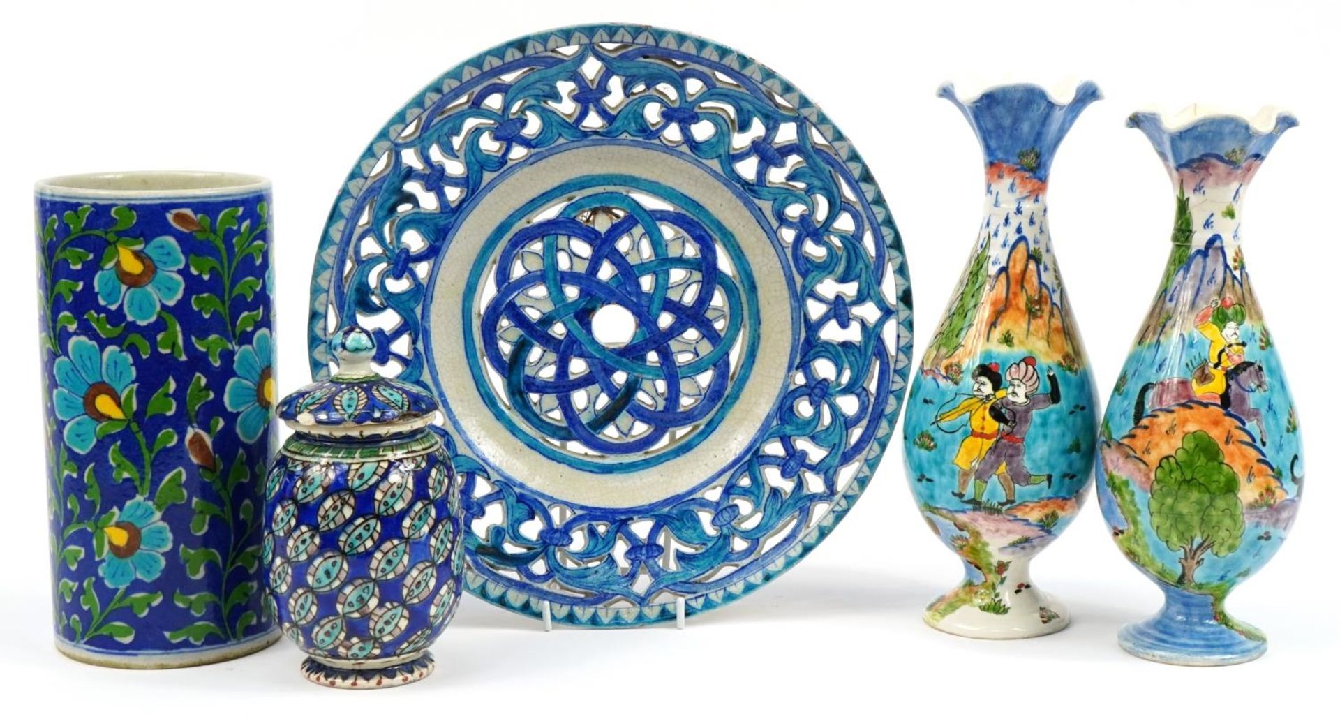 Turkish pottery including a pair of vases hand painted with huntsmen on horseback, pierced plate and