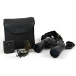 Pair of Nikon Action BJ556671 binoculars with case and a pocket compass