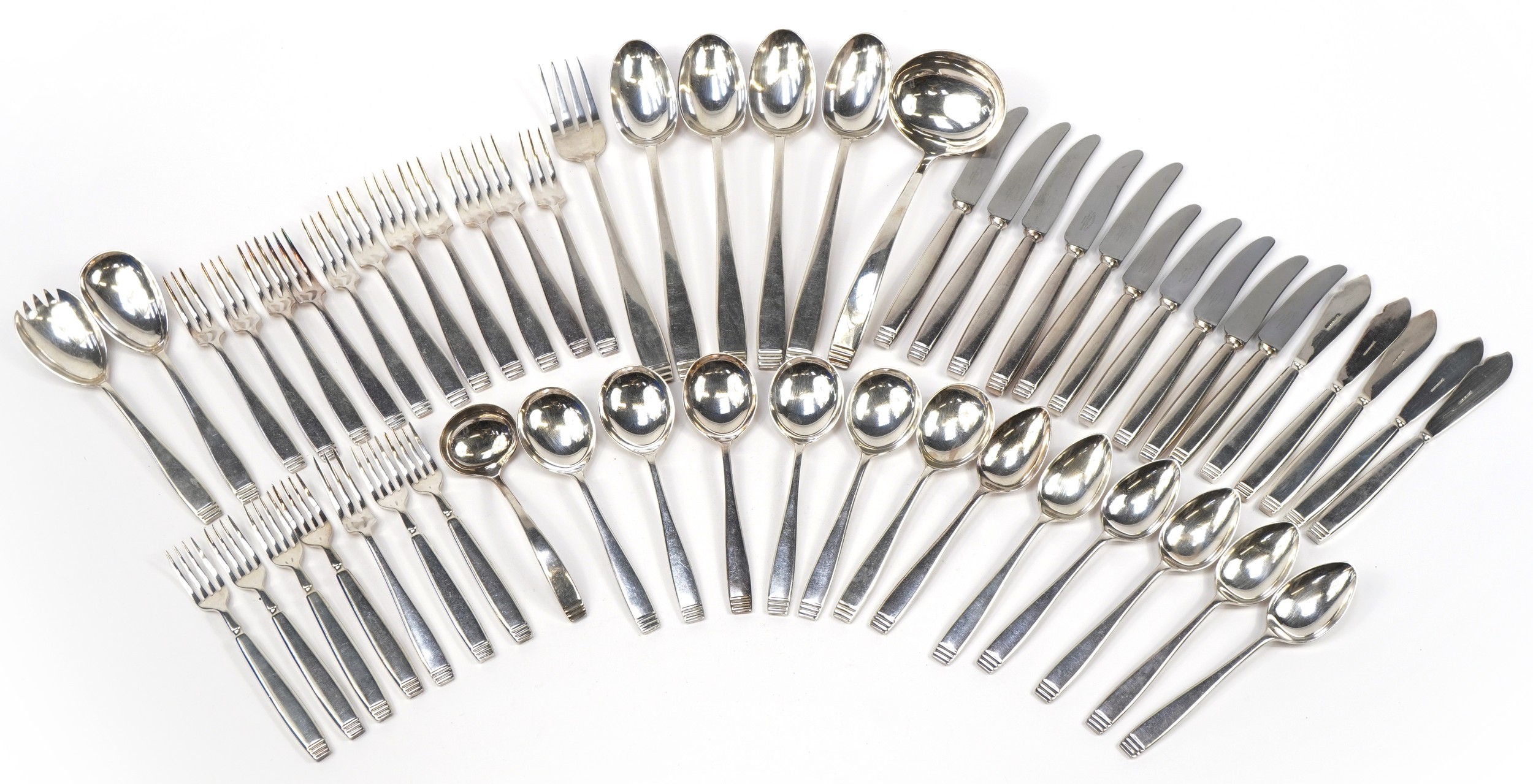 Suite of Elkington & Co silver plated cutlery including salad servers, the largest each 28cm in