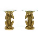 Pair of gilt monkey design occasional tables with circular glass tops, 49.5cm high x 43cm in