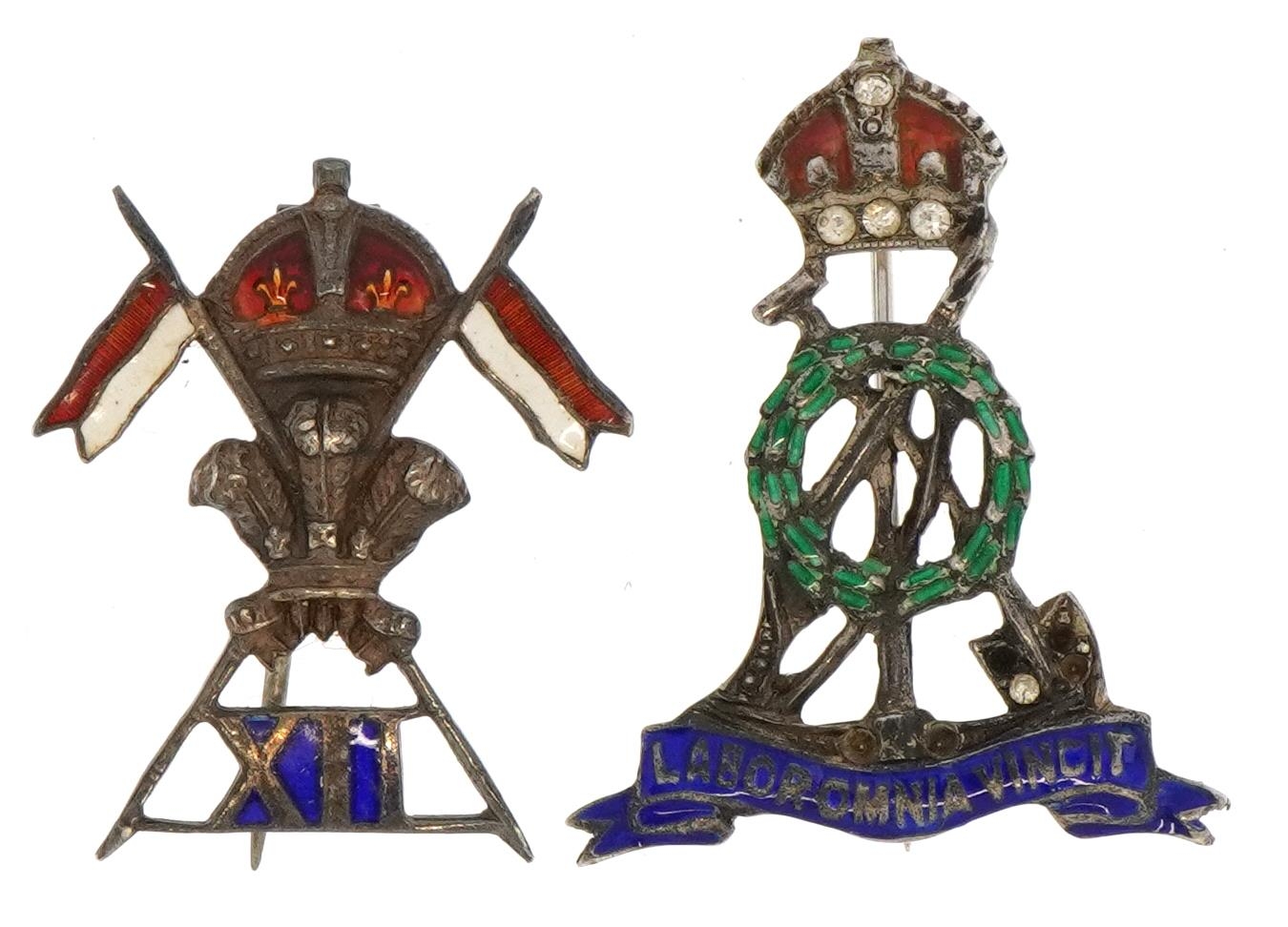 Two military interest white metal and enamel badges including Royal Pioneer Corps Officers badge,