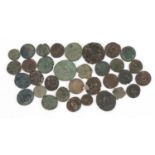 Twenty Roman and later coins, various denominations and emperors