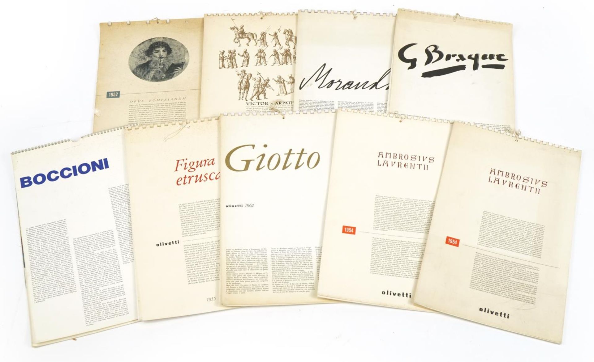 Nine vintage 1950s and 1960s calendars including Olivetti