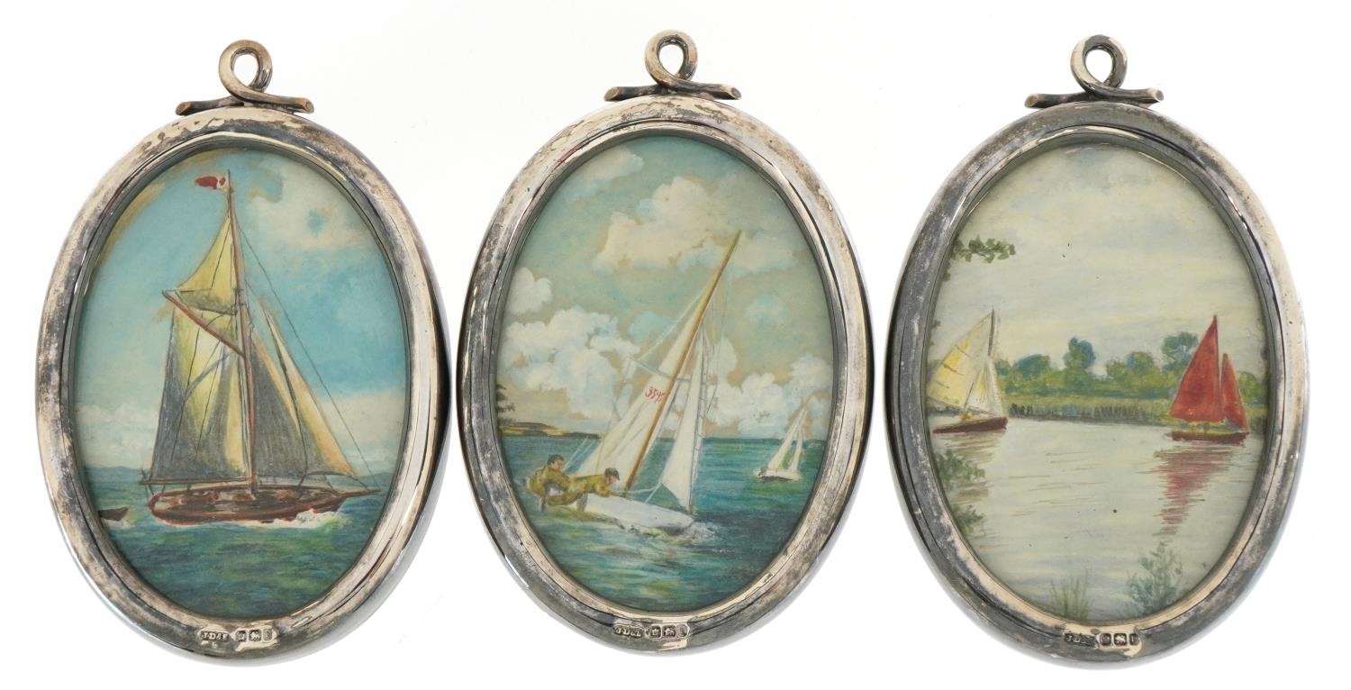 James Dixon & Sons Ltd, set of three Edwardian oval silver photo frames, each housing a