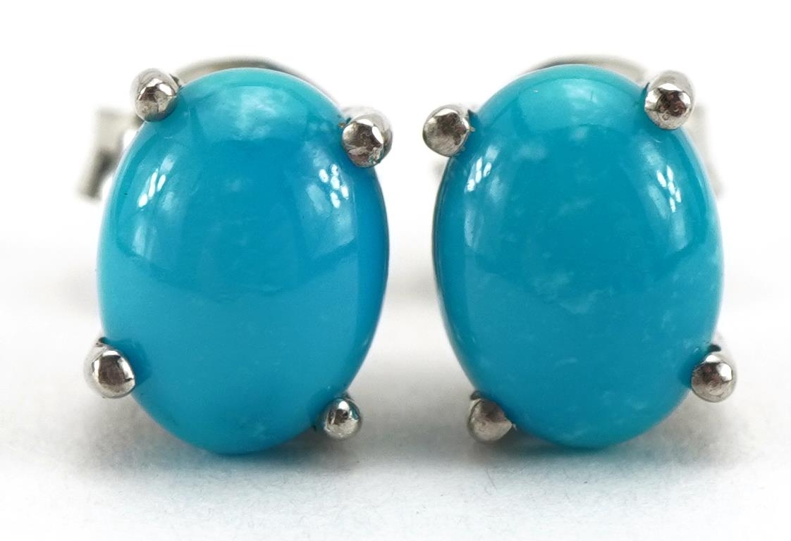 Pair of silver cabochon turquoise stud earrings, 8mm high, 1.7g