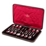 Elkington & Co Ltd, cased set of twelve silver plated apostle teaspoons with matching caddy spoon