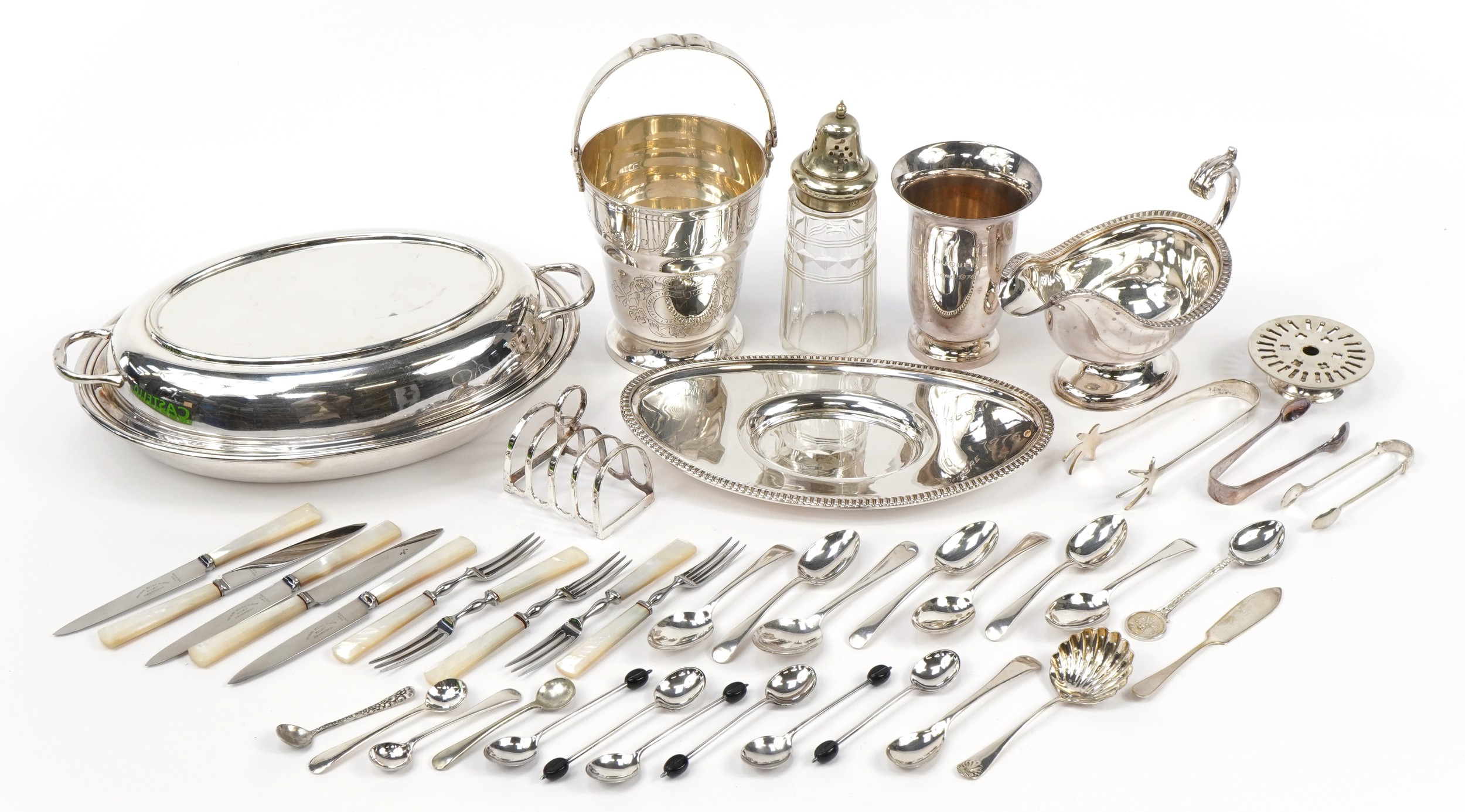 Silverplate including an oval entree dish with cover, ice bucket with swing handle, sauceboat and