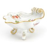 Meissen, German porcelain three footed shell shaped salt hand painted with flowers, 9.5cm in length