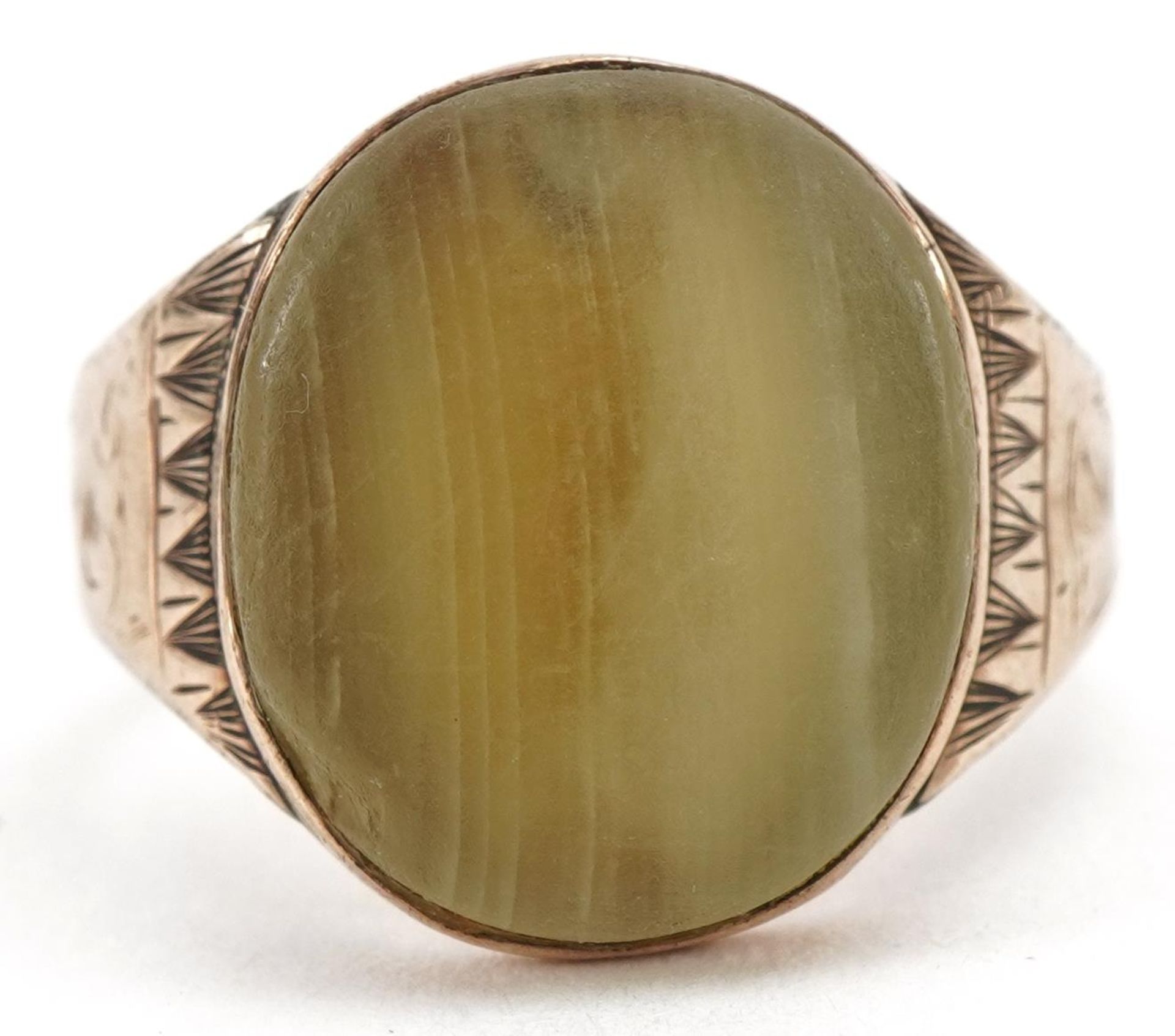 Antique rose gold green onyx signet ring with engraved shoulders, possibly Georgian, the onyx