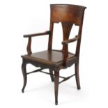 Jas Shoolbred and Co, mahogany armchair with H stretcher, 100cm high