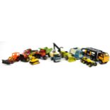 Nine vintage tinplate and diecast vehicles including Tonka, the largest 48cm in length