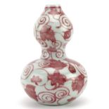 Chinese porcelain iron red double gourd vase hand painted with flowers amongst scrolling foliage,