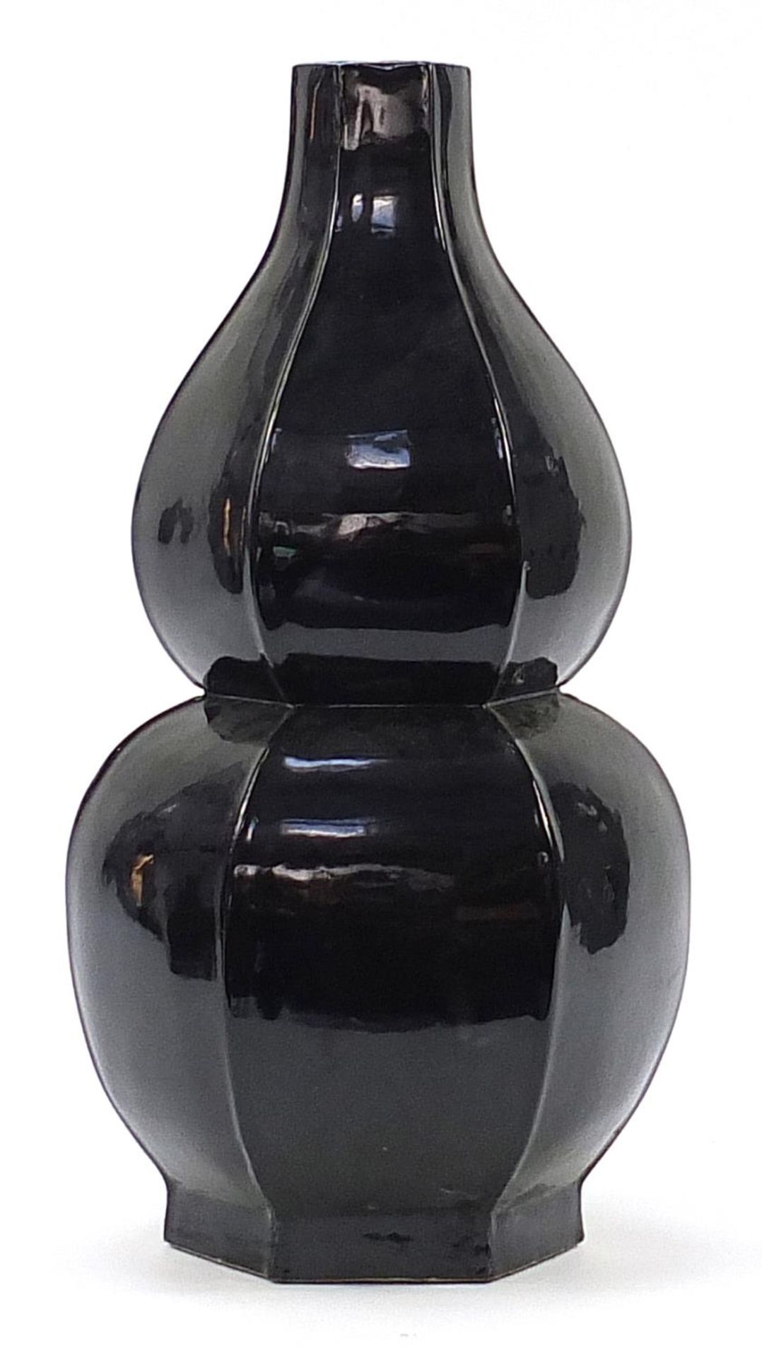 Large Chinese porcelain hexagonal double gourd vase having a black glaze, 64cm high