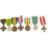 Seven French military interest medals including Madagascar Commemorative and Madagascar medal