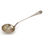 Georgian silver ladle with embossed shell design bowl, indistinct hallmarks, possibly London 1754,