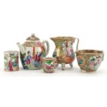 Chinese Canton porcelain including a teapot and three footed jug, each hand painted in the famille