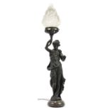 Bronzed design table lamp in the form of an Art Nouveau female with frosted flame glass shade,