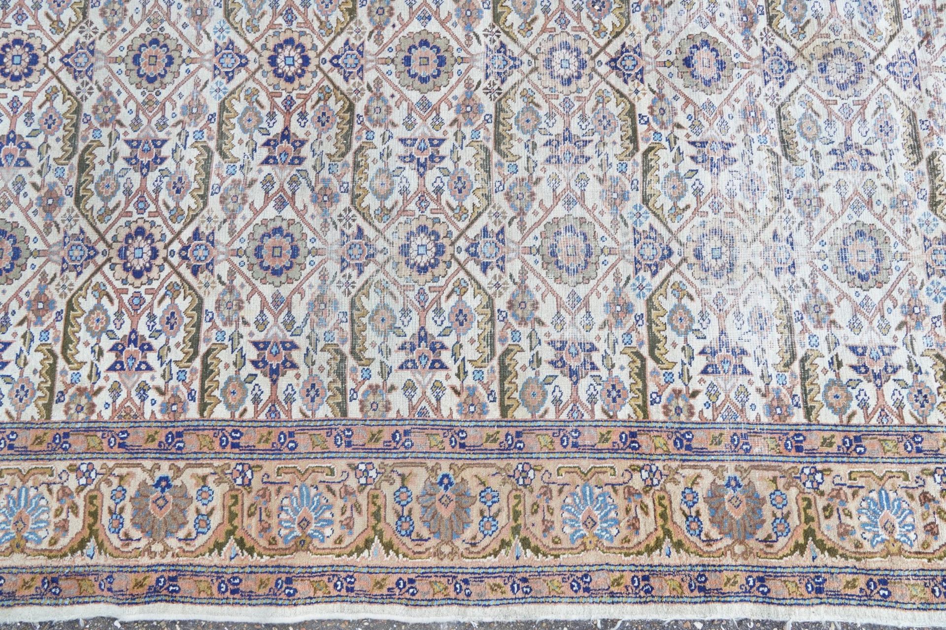 Rectangular Persian rug having an allover floral design within corresponding borders, 345cm x 255cm - Image 9 of 11