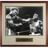 Boxing interest George Foreman and Muhammad Ali display with ink signatures of George Foreman