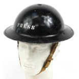 Military interest Daily Express press tin helmet with liner