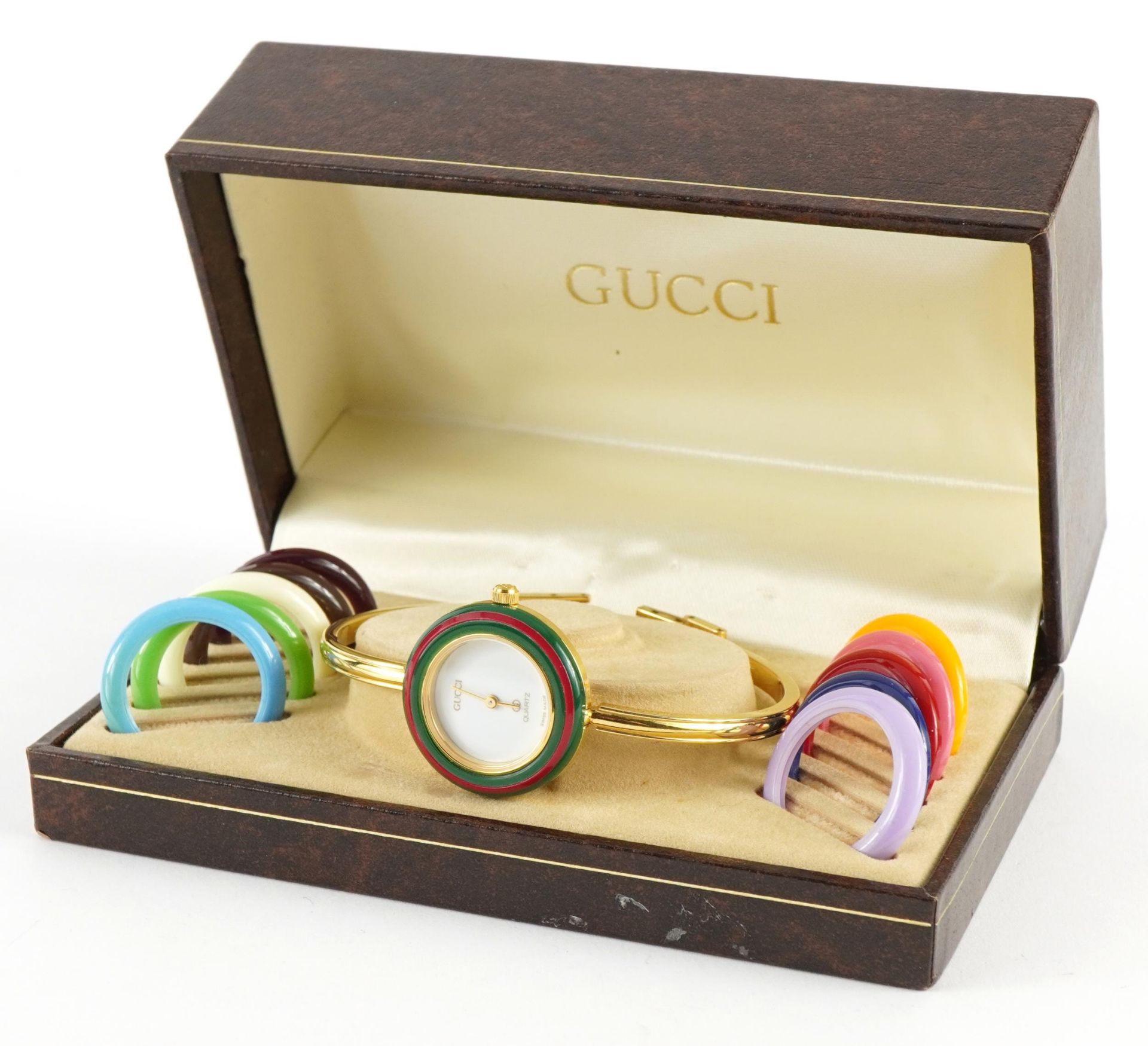 Ladies Gucci quartz wristwatch with interchangeable bezels and Gucci box, the case numbered 1100-L