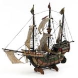 Hand painted wooden model of a Tudor sailing ship, 57cm high x 72cm in length