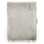 Elizabeth II rectangular silver cigarette case with engine turned decoration and gilt interior,