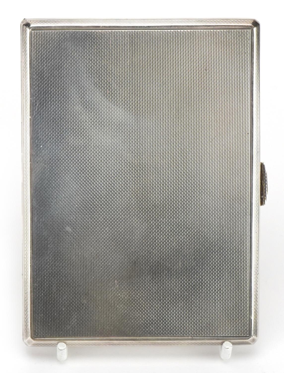 S J Rose & Son, Elizabeth II rectangular silver cigarette case with engine turned decoration and