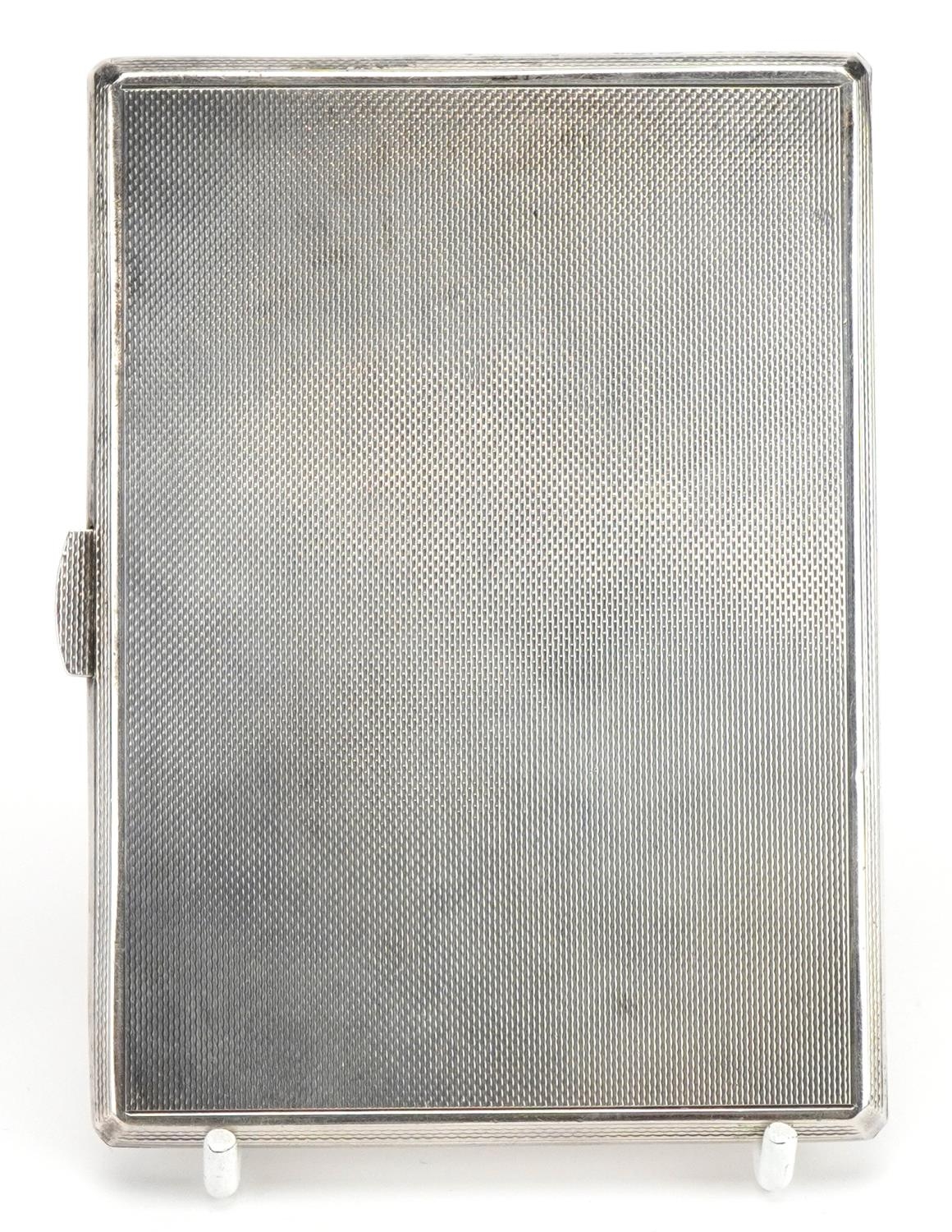 S J Rose & Son, Elizabeth II rectangular silver cigarette case with engine turned decoration and - Image 4 of 4