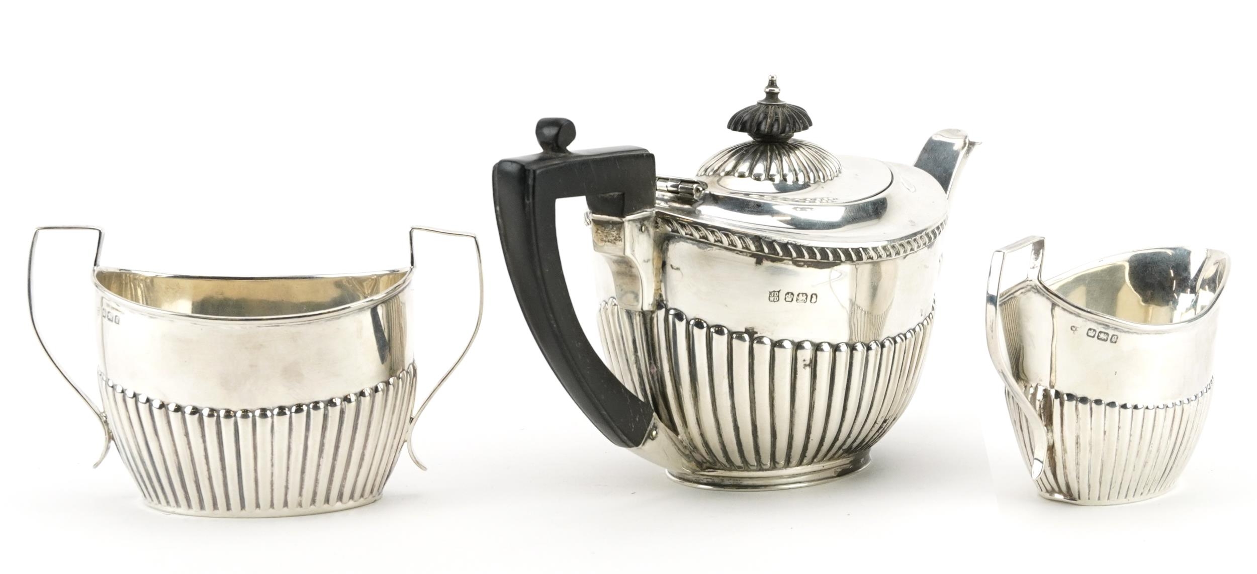 James Deakin & Sons, Victorian silver three piece tea set with demi fluted body, Sheffield 1896, the - Image 2 of 5