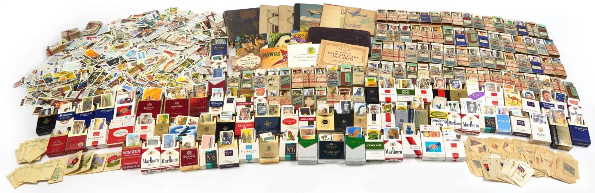 Extensive collection of cigarette and tea cards, some arranged in albums including Brooke Bond