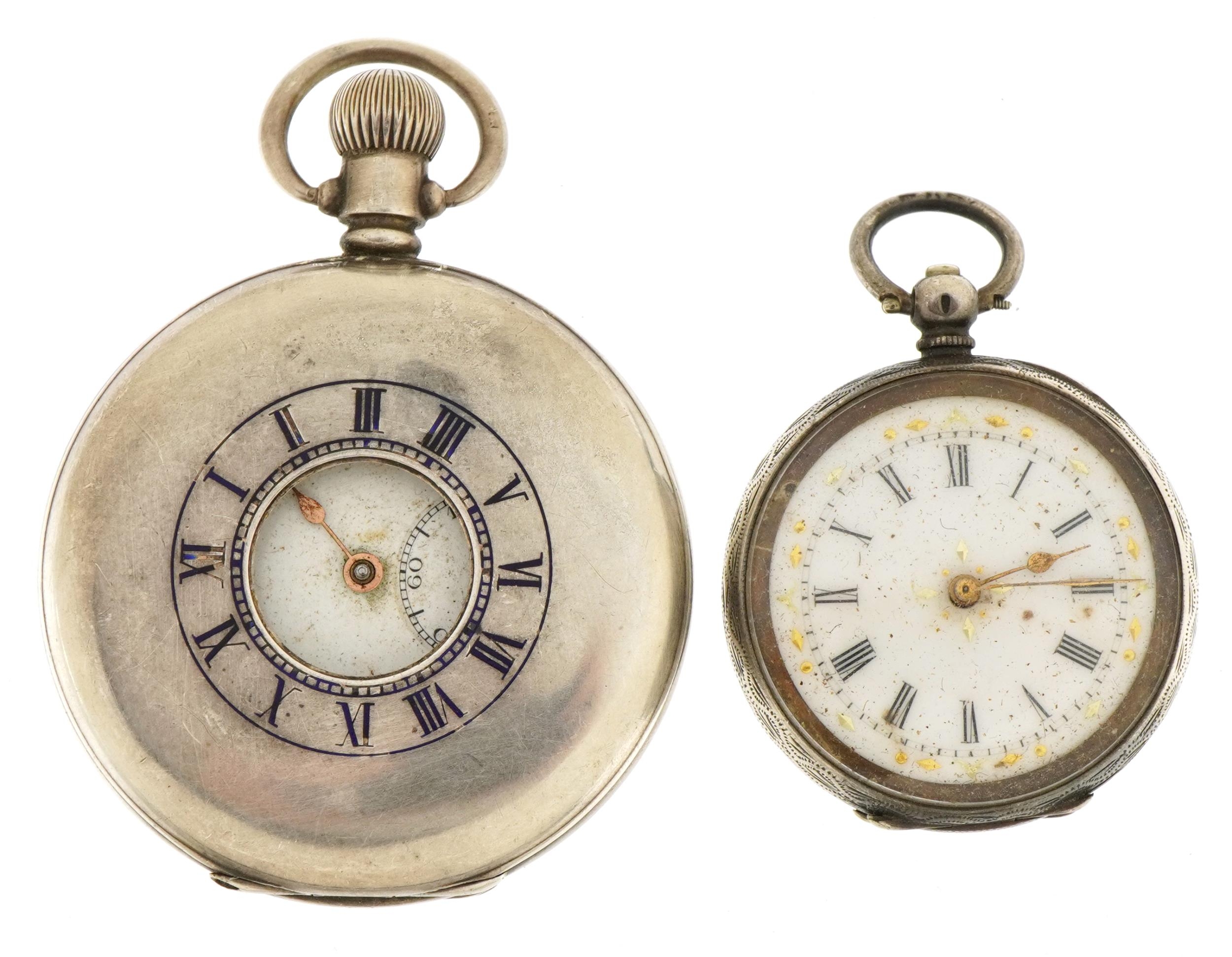 Gentlemen's silver half hunter pocket watch with blue enamel Roman numerals and a ladies silver