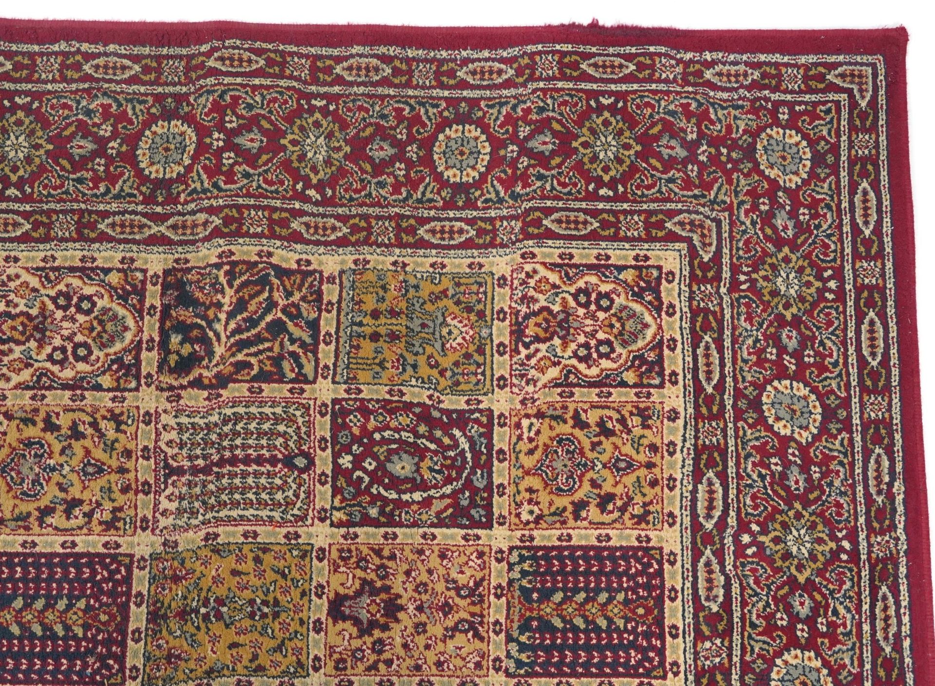 Rectangular Persian rug, the central field having a repeat tree design, the red ground borders - Bild 3 aus 7