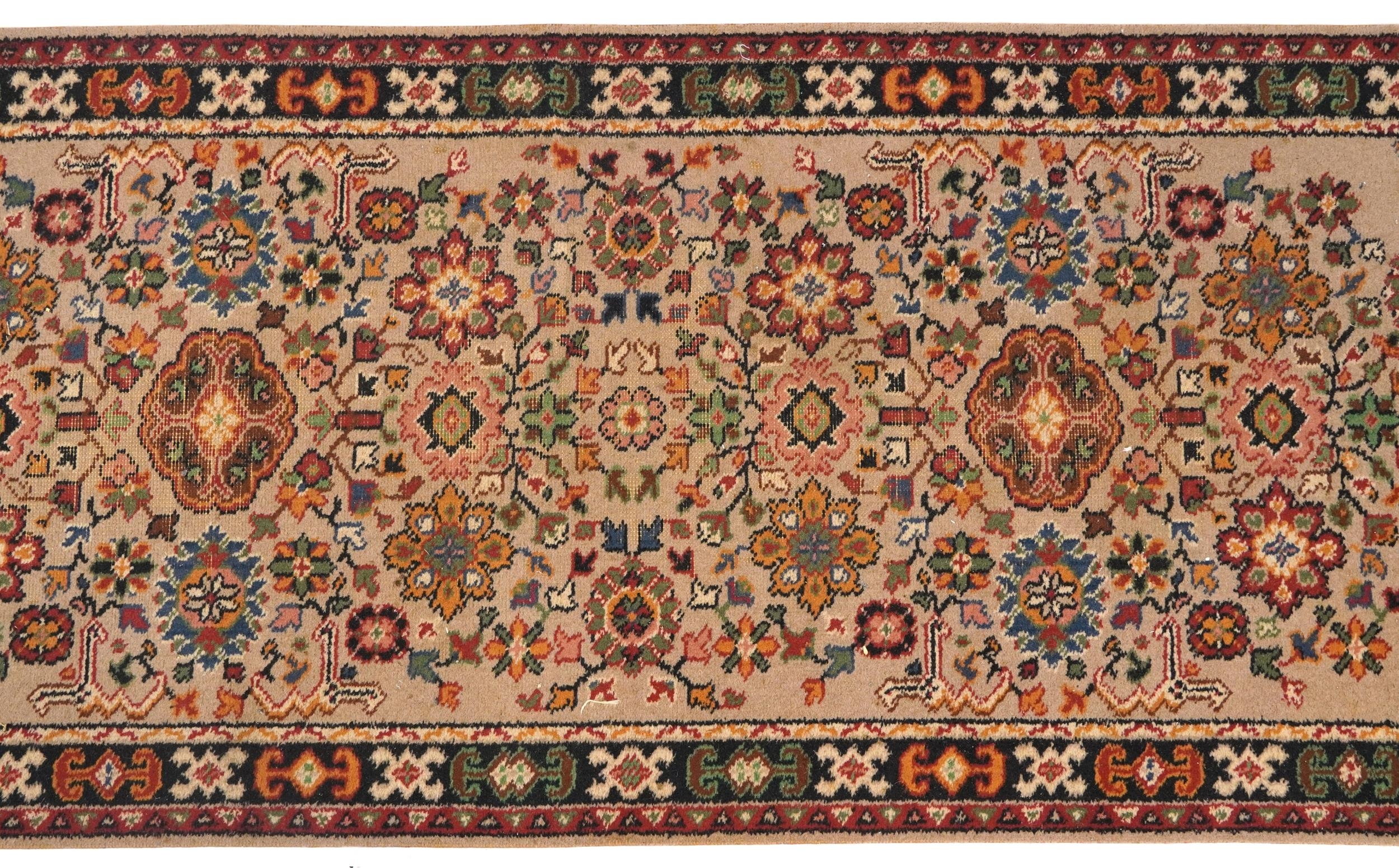 Rectangular floral carpet runner the central field having a beige ground, 270cm x 90cm - Image 3 of 5
