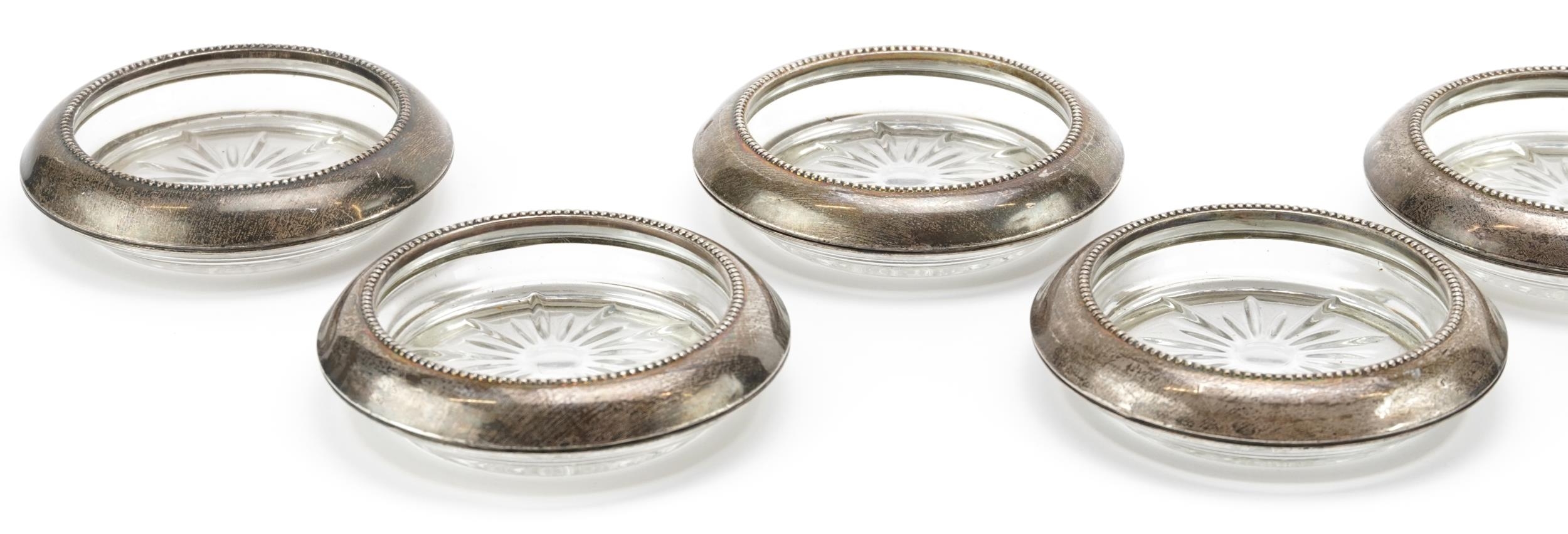 Frank M Whiting, set of seven circular sterling silver mounted dishes, 10cm in diameter - Image 2 of 4