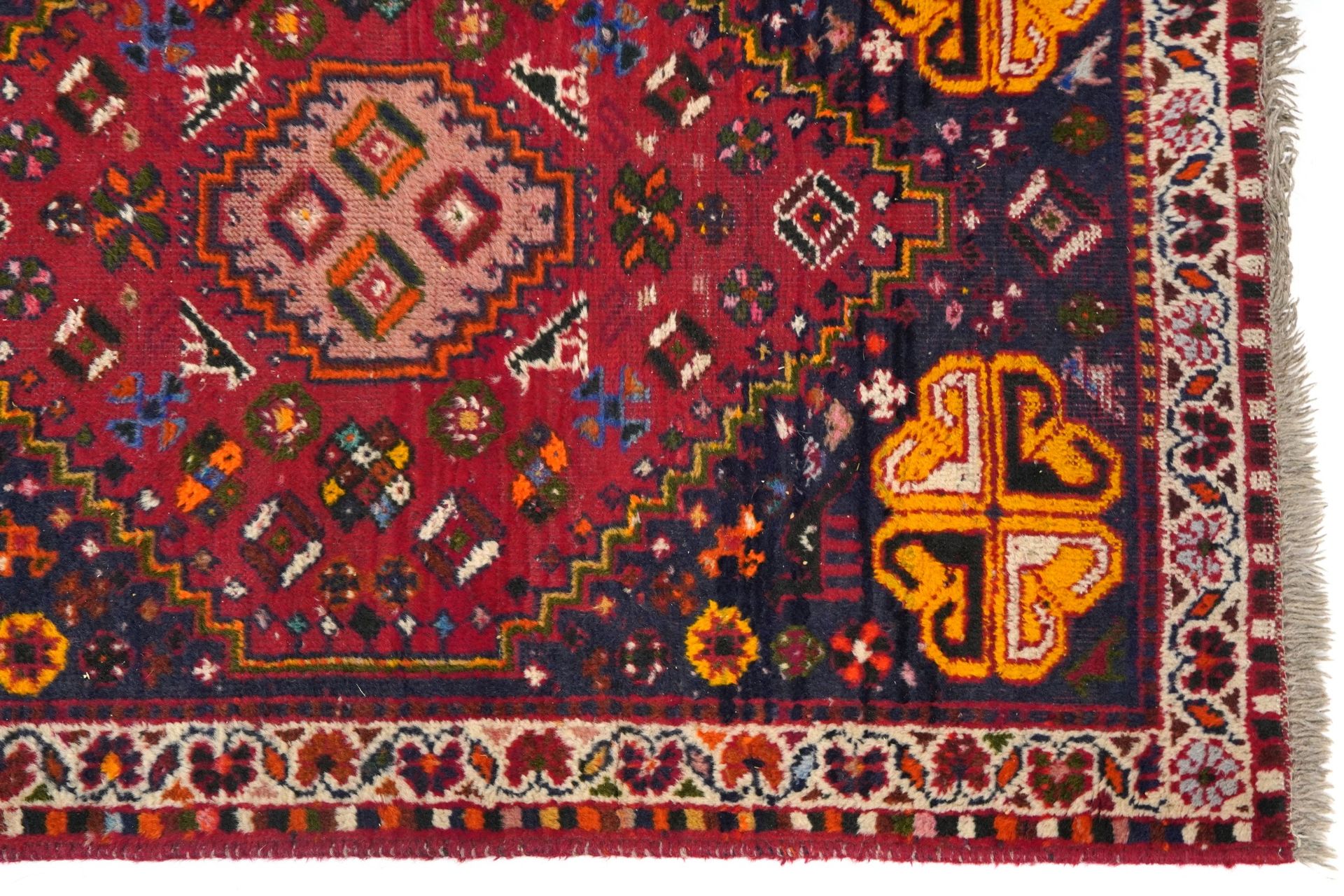 Rectangular red and blue ground rug having and allover geometric and animal design, 145cm x 102cm - Image 5 of 6