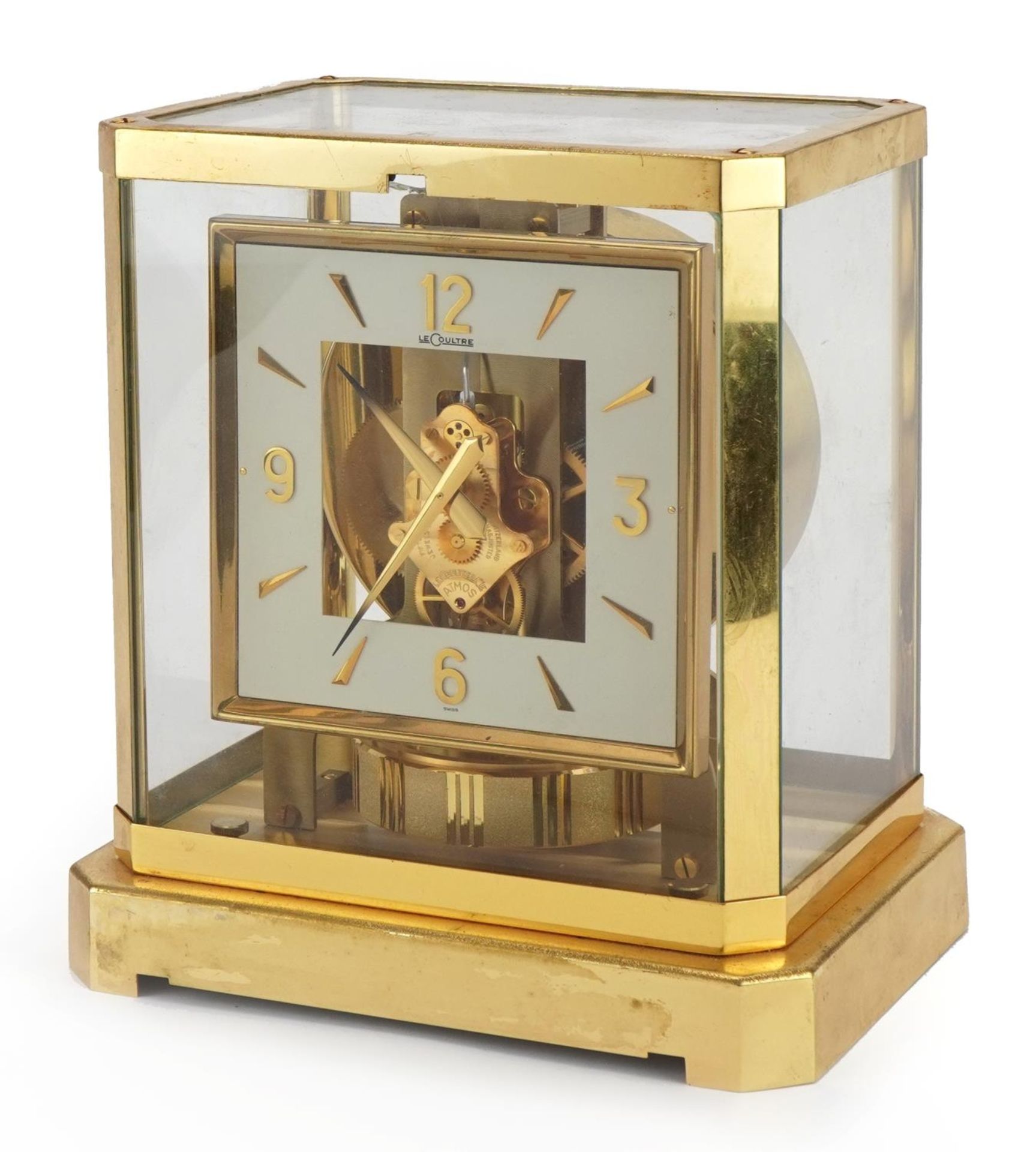 Jaeger LeCoultre brass cased Atmos clock, the square chapter ring having Arabic numerals, serial