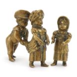 Two Victorian patinated bronze figure groups of children playing, the largest 8.5cm in length