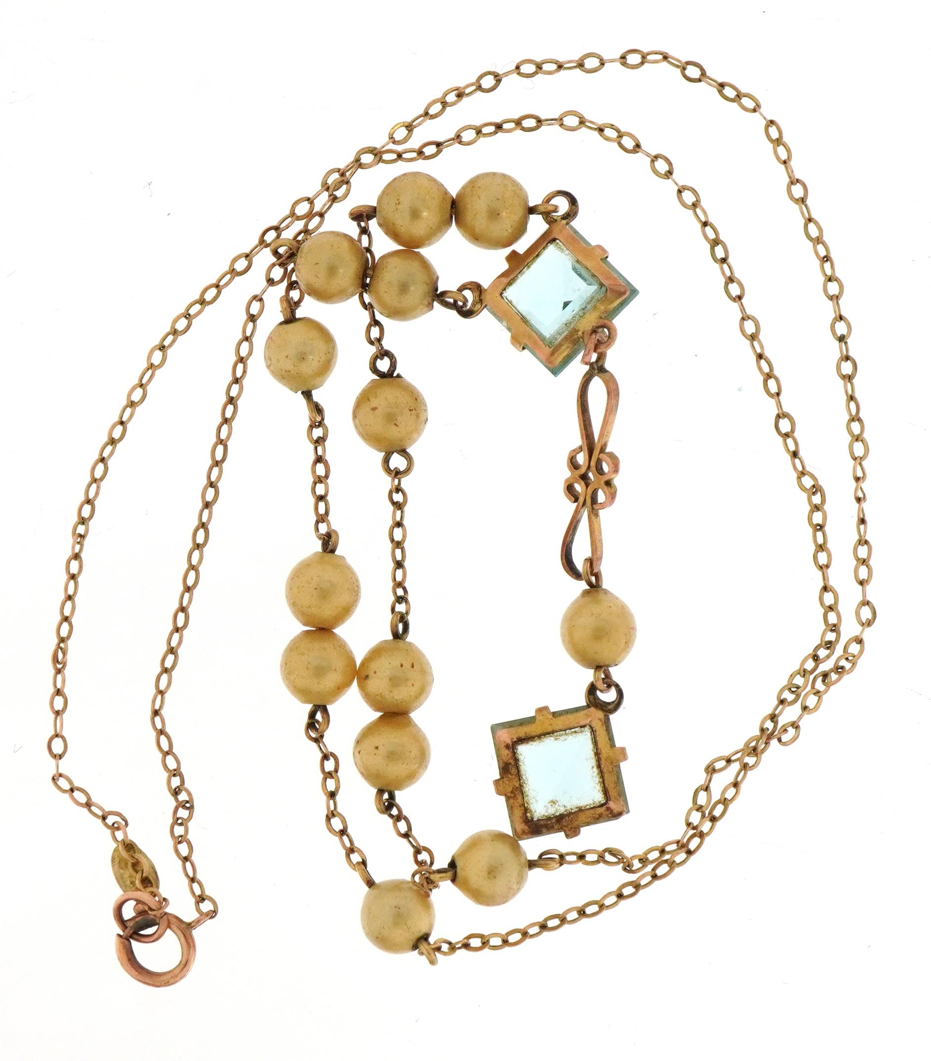 Art Deco 9ct rose gold necklace set with pearls and two blue stones, housed in a Byrne oval - Image 3 of 5