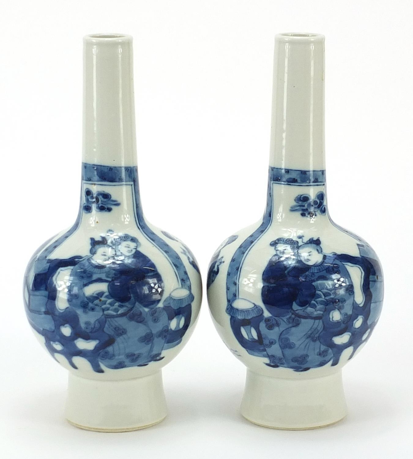 Pair of Chinese blue and white porcelain vases hand painted with figures and Daoist emblems,