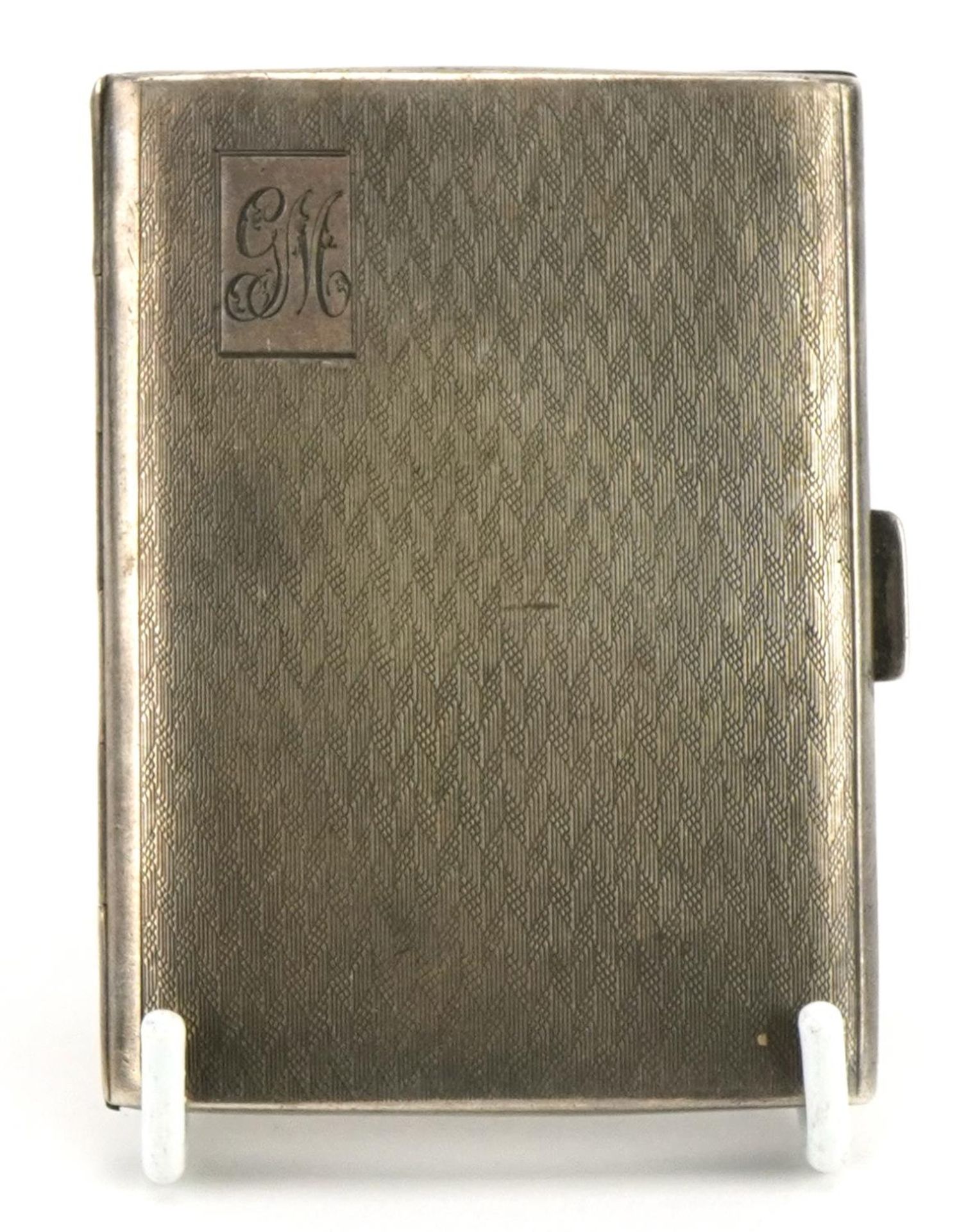 Bravingtons, George V rectangular silver cigarette case with engine turned decoration, Birmingham