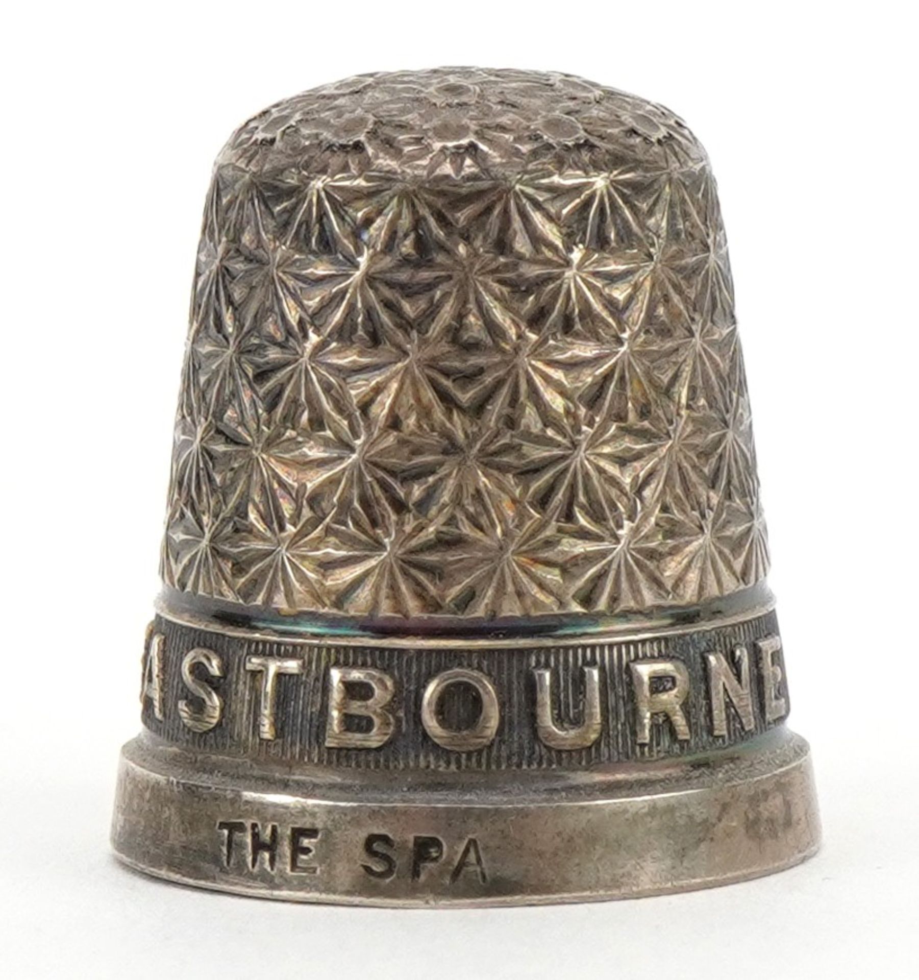 Silver Eastbourne thimble, Birmingham 1929, 2.0cm high, 3.8g For further information on this lot