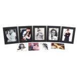 Nine James Bond interest photographs, each signed in ink including Bond Girls Shirley Eaton and