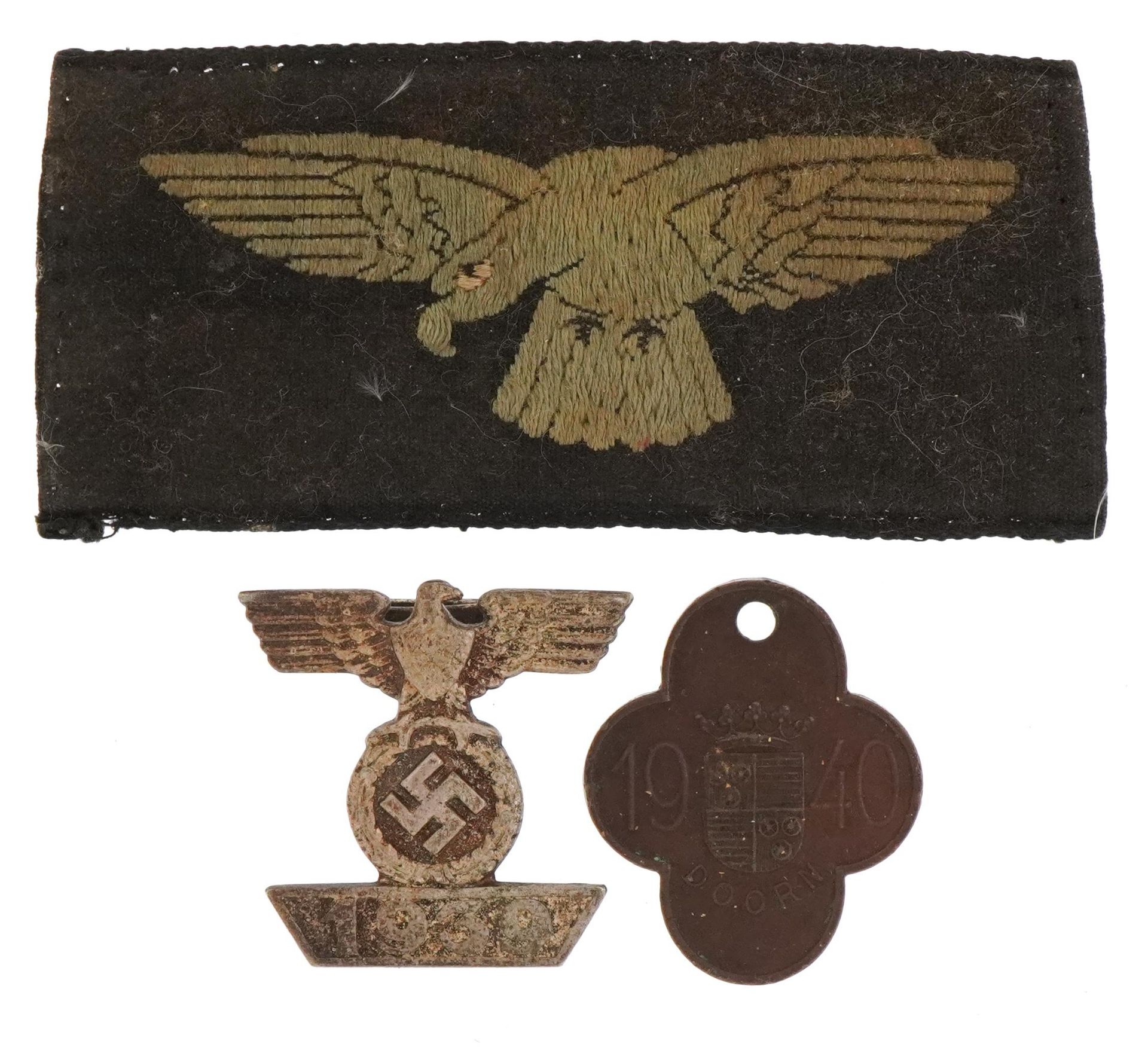 German militaria including 1939 badge and cloth badge For further information on this lot please