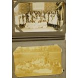 Edwardian and later social history and military real photographic postcards arranged in an album